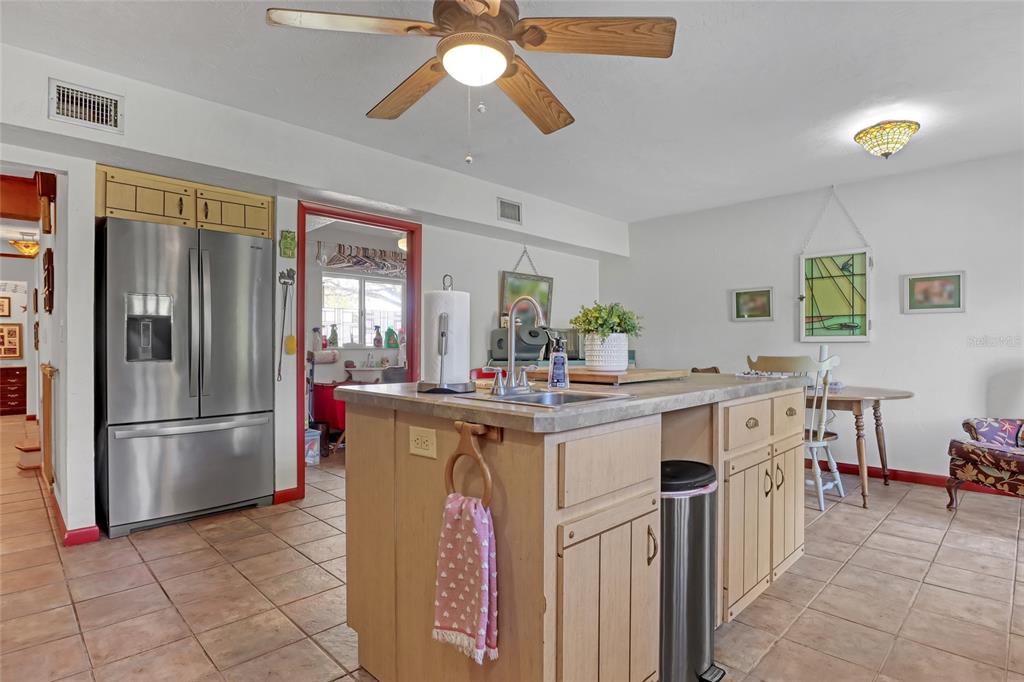 5005 Highway 1 Mims, FL 32754 - Photo 20 of 69 a kitchen with a sink refrigerator and window