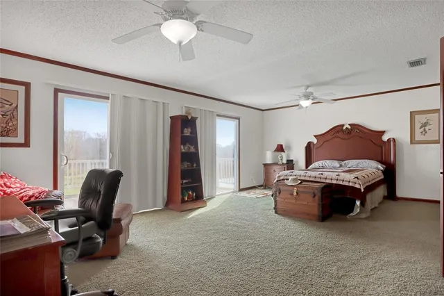 a bathroom with a toilet sink and shower