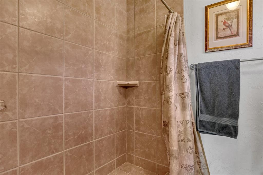 5005 Highway 1 Mims, FL 32754 - Photo 34 of 69 a bathroom with a shower and a sink