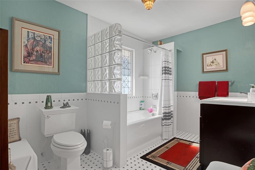 5005 Highway 1 Mims, FL 32754 - Photo 42 of 69 a bathroom with a toilet sink and shower