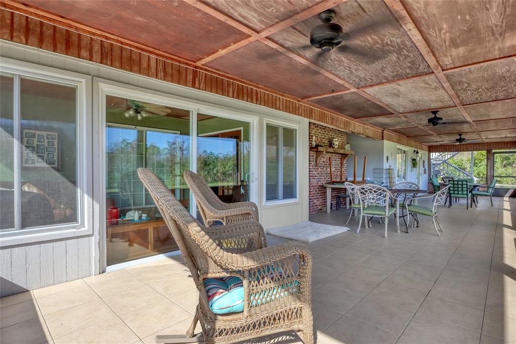 5005 Highway 1 Mims, FL 32754 - Photo 52 of 69 a view of a dining room with furniture window and outside view