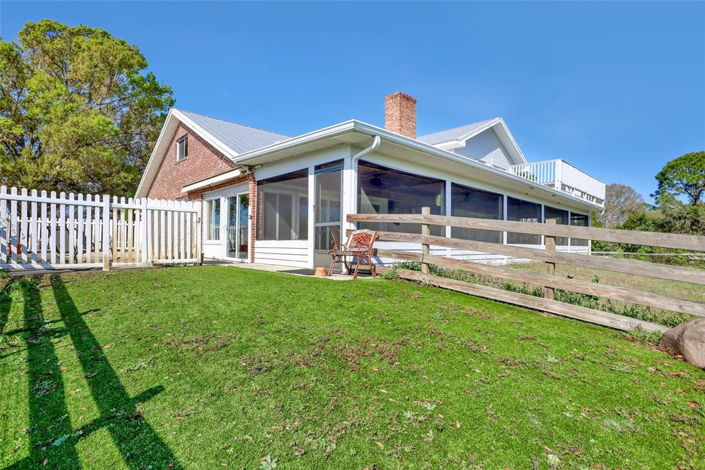 5005 Highway 1 Mims, FL 32754 - Photo 56 of 69 a front view of a house with garden