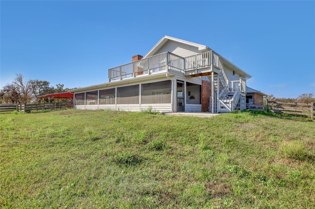5005 Highway 1 Mims, FL 32754 - Photo 59 of 69 a large brick building with a big yard and large trees