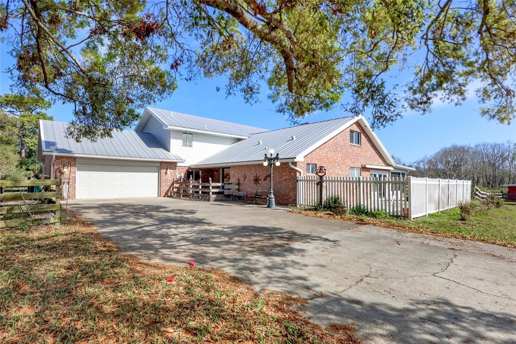 5005 Highway 1 Mims, FL 32754 - Photo 6 of 69 a view of a house with a yard