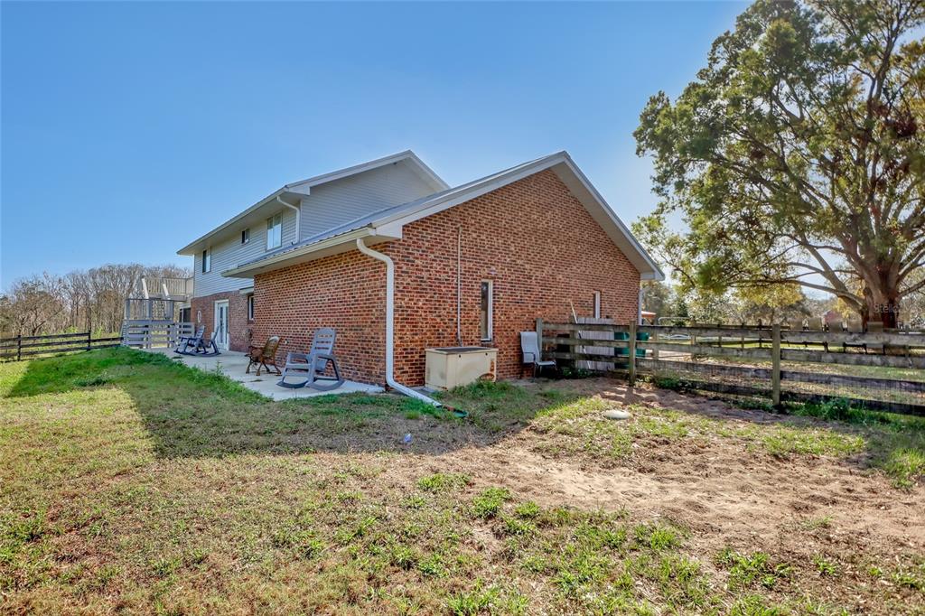 5005 Highway 1 Mims, FL 32754 - Photo 62 of 69 a view of a house with backyard and trees