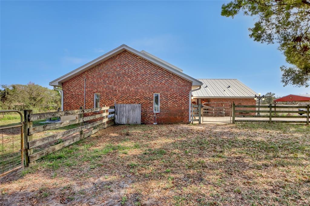 5005 Highway 1 Mims, FL 32754 - Photo 65 of 69 a backyard of a house with lots of green space