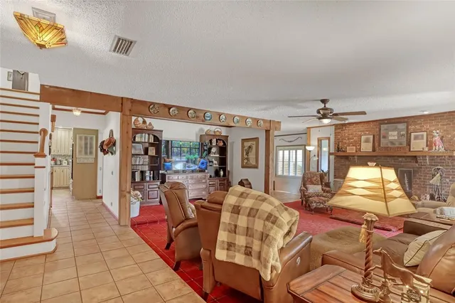 a living room with furniture and window