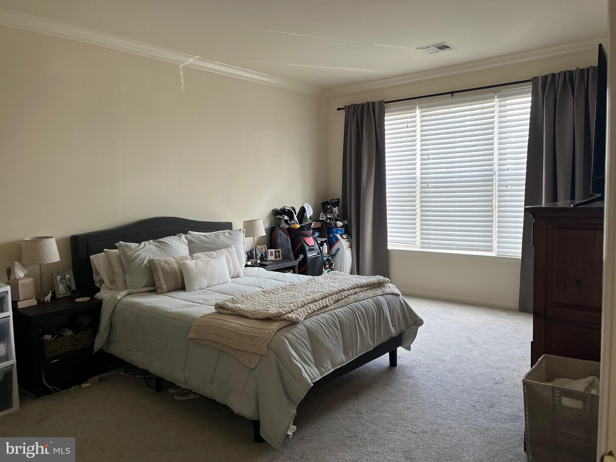 435 Masterson Court Ewing, NJ 08618 - Photo 7 of 14 a bedroom with a bed and a window