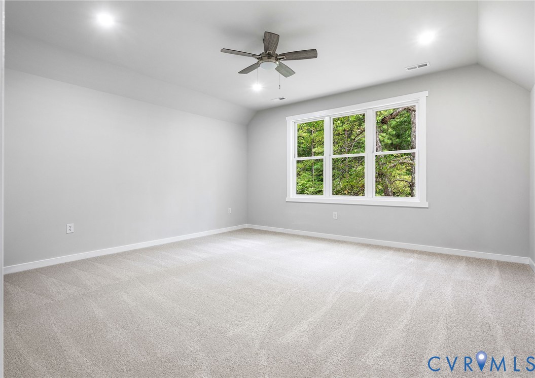 10601 Beaver Bridge Road Chesterfield, VA 23838 - Photo 32 of 39 Spacious room featuring light gray carpeting, neut