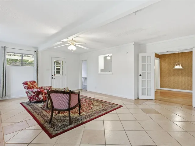 a living room with furniture and a table