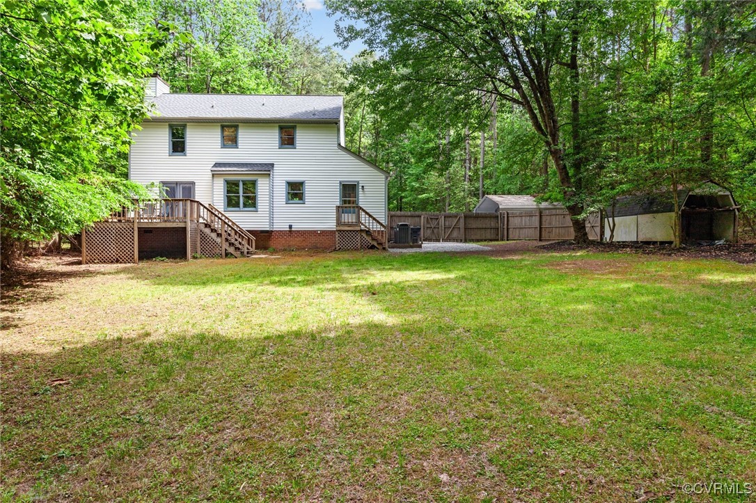 3138 Pineview Drive Powhatan, VA 23139 - Photo 14 of 46 a view of a house with a yard and sitting area