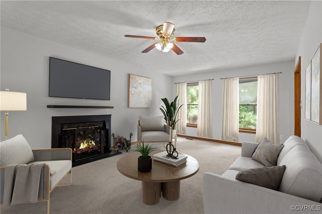 3138 Pineview Drive Powhatan, VA 23139 - Photo 18 of 46 a living room with furniture and a fireplace