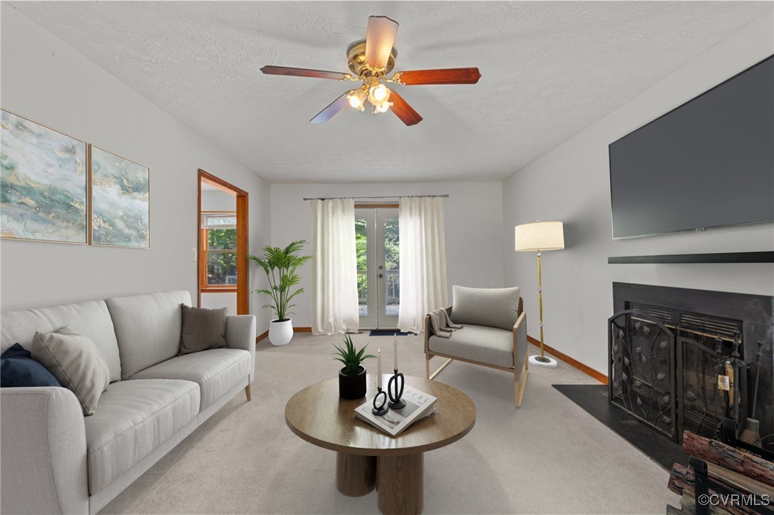 3138 Pineview Drive Powhatan, VA 23139 - Photo 19 of 46 a living room with furniture and a fireplace