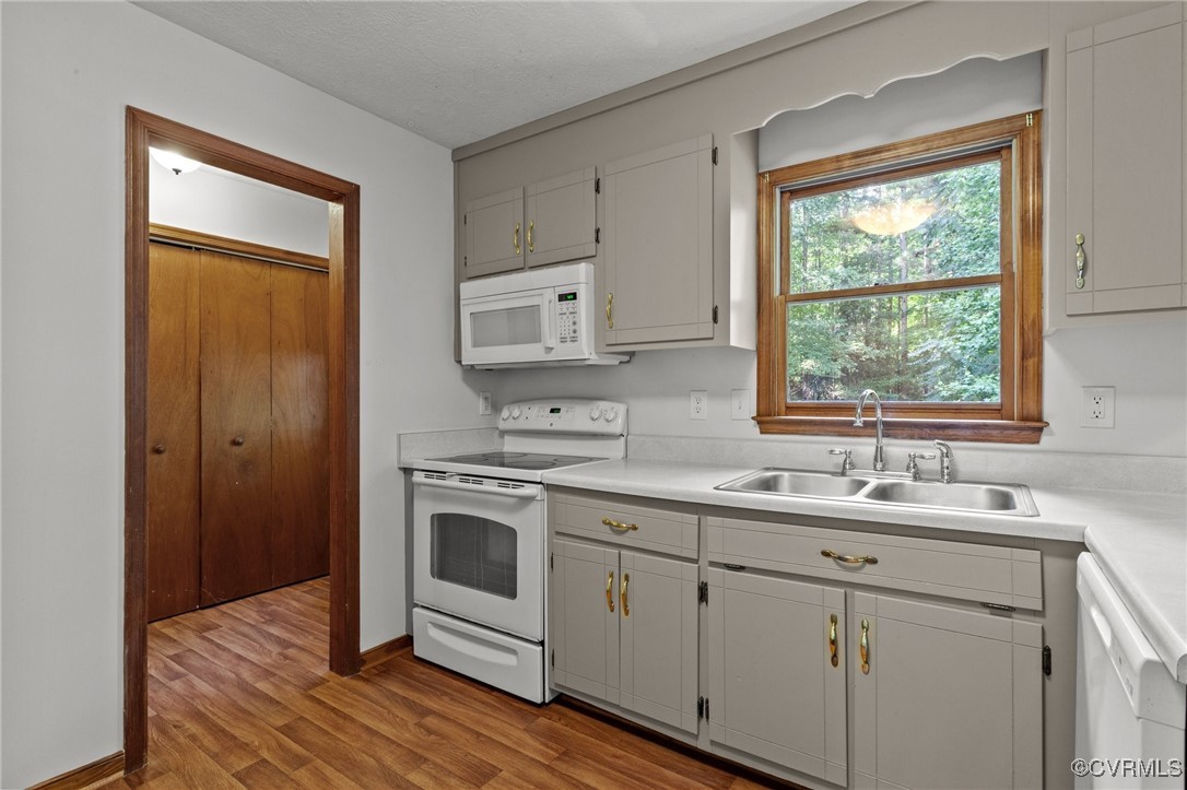 3138 Pineview Drive Powhatan, VA 23139 - Photo 26 of 46 a kitchen with appliances cabinets and a sink