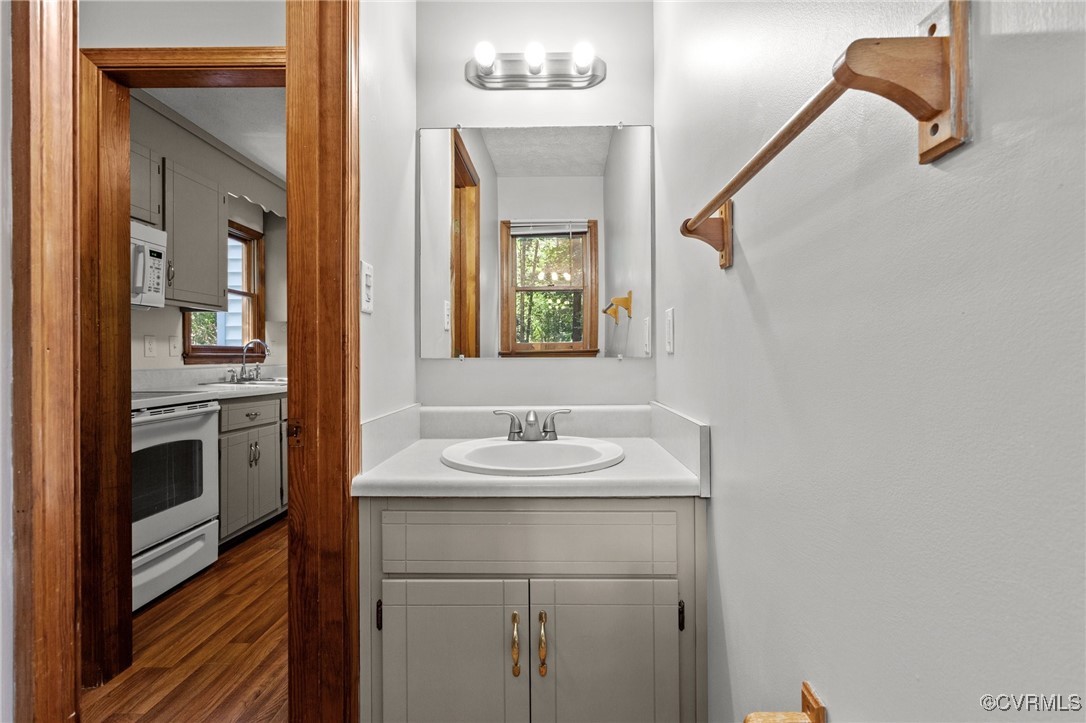3138 Pineview Drive Powhatan, VA 23139 - Photo 32 of 46 a bathroom with a sink and a mirror