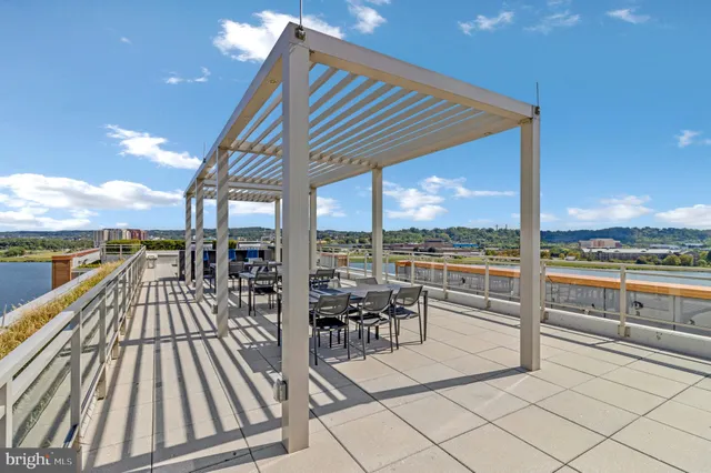 a view of balcony with furniture