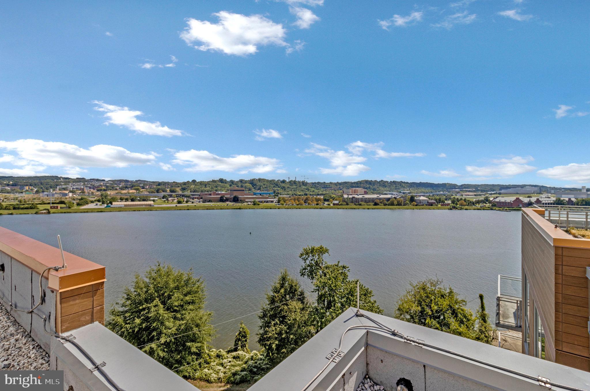 88 V Street Southwest, Unit 505 Washington, DC 20024 - Photo 31 of 38 a view of a lake with a mountain in the background