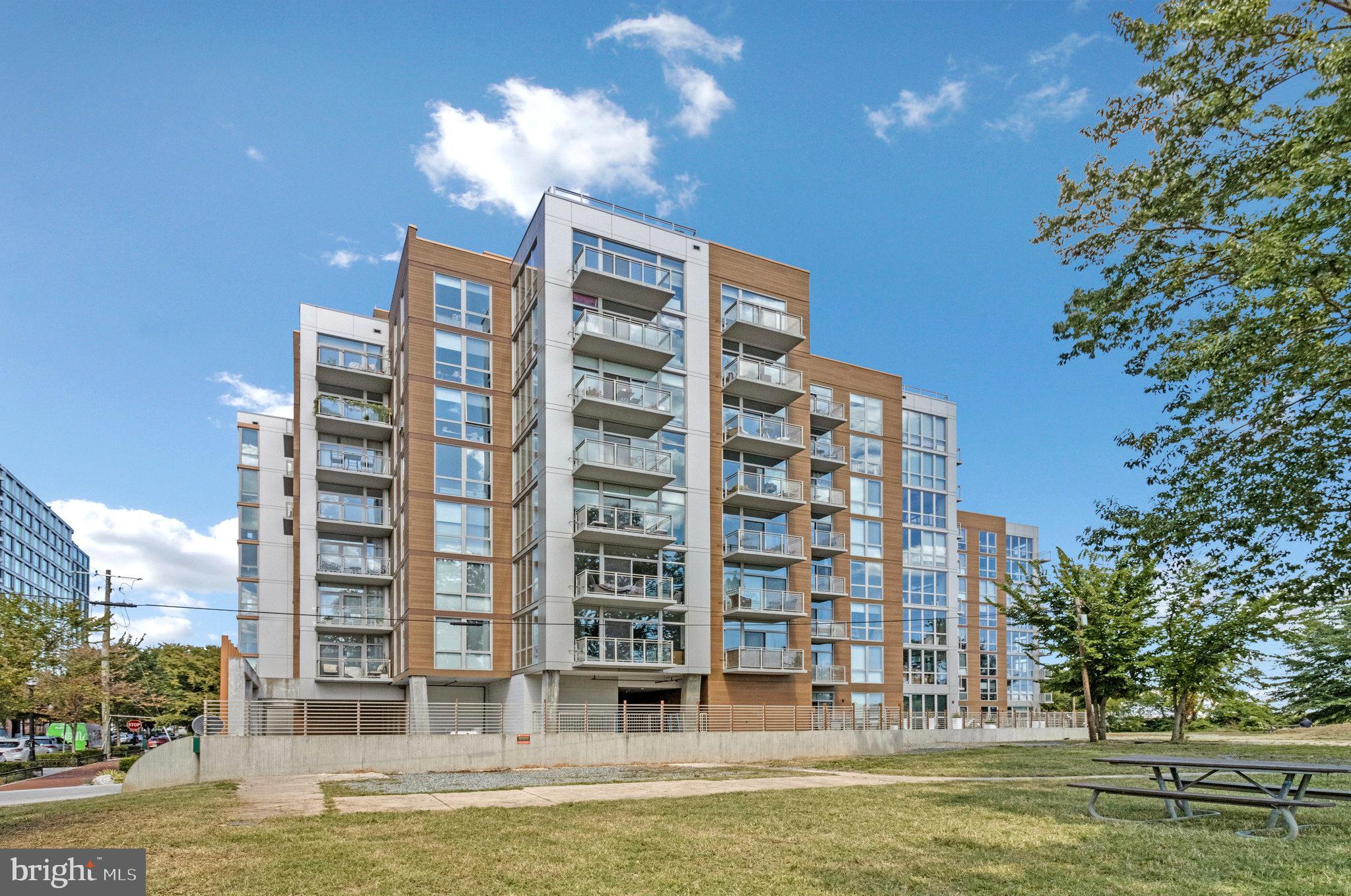 88 V Street Southwest, Unit 505 Washington, DC 20024 - Photo 5 of 38 a front view of a building with street view