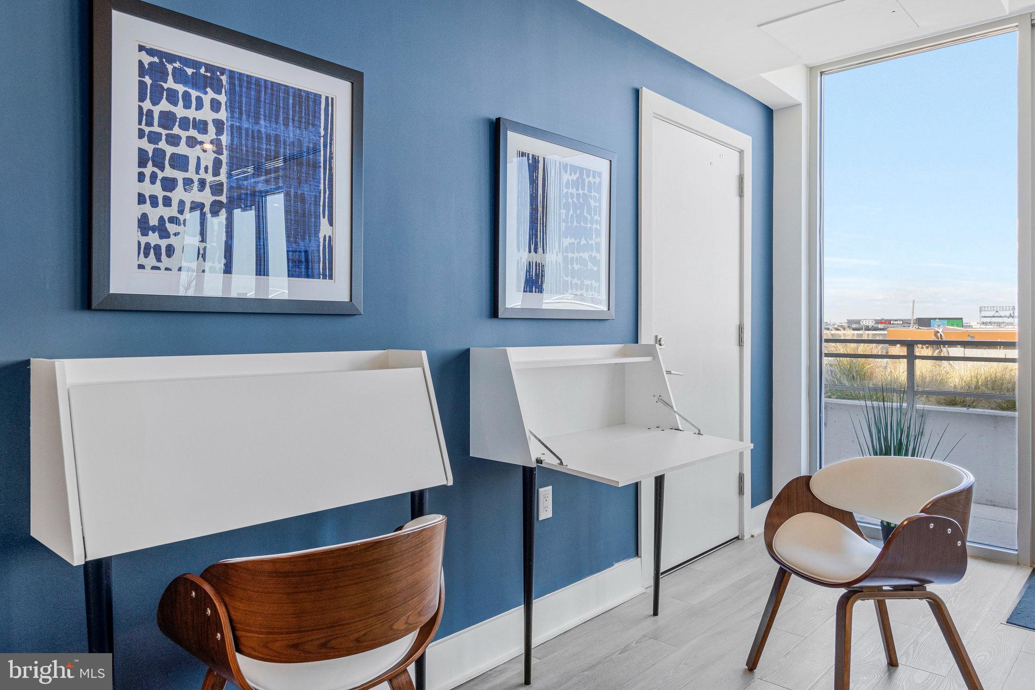 88 V Street Southwest, Unit 505 Washington, DC 20024 - Photo 10 of 38 a living room with furniture and a window