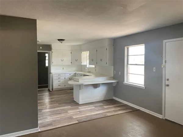 a view of kitchen and sink