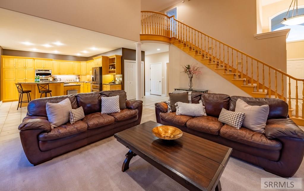 305 Spring Meadows Drive Idaho Falls, ID 83404 - Photo 15 of 66 Family room and kitchen