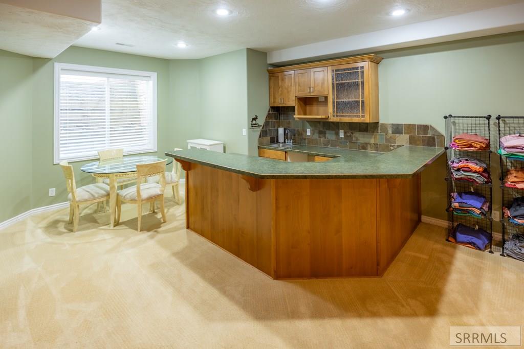 305 Spring Meadows Drive Idaho Falls, ID 83404 - Photo 33 of 66 Large Kitchenette/Wet Bar in Basement livining roo