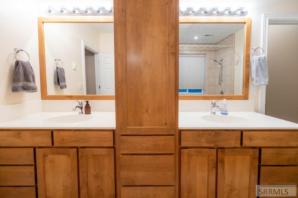 305 Spring Meadows Drive Idaho Falls, ID 83404 - Photo 42 of 66 Basement master bathroom with double vanity