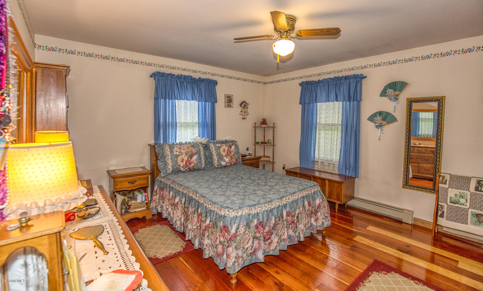 333 South County Road Florida, MA 01343 - Photo 20 of 32 a bedroom with a bed and a chandelier