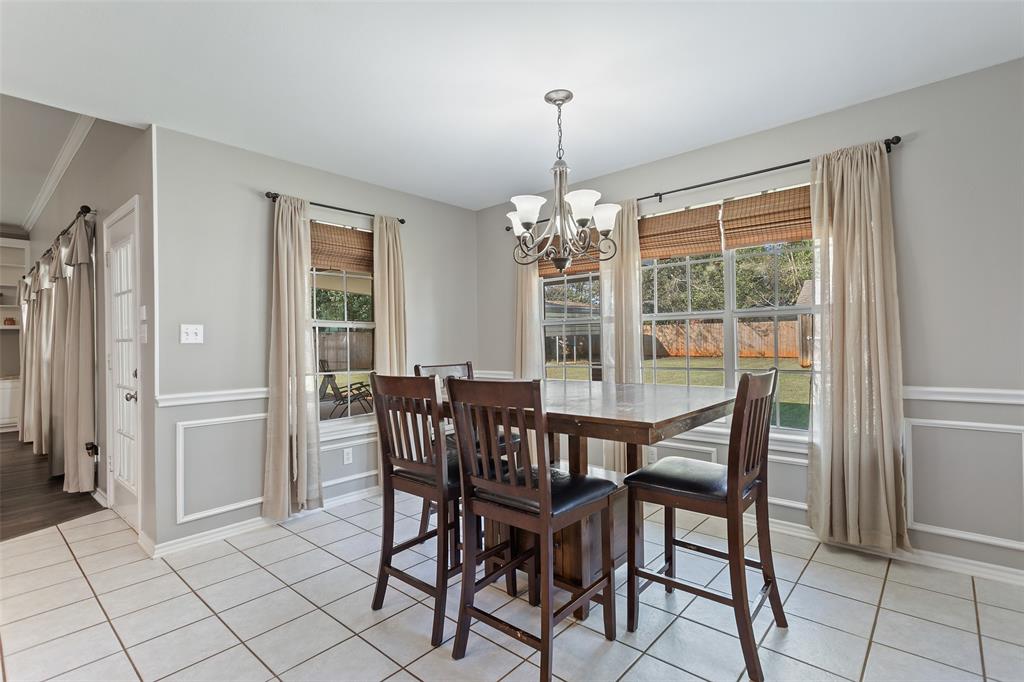 706 Maji Road Whitehouse, TX 75791 - Photo 11 of 37 a view of a dining room with furniture and chandelier