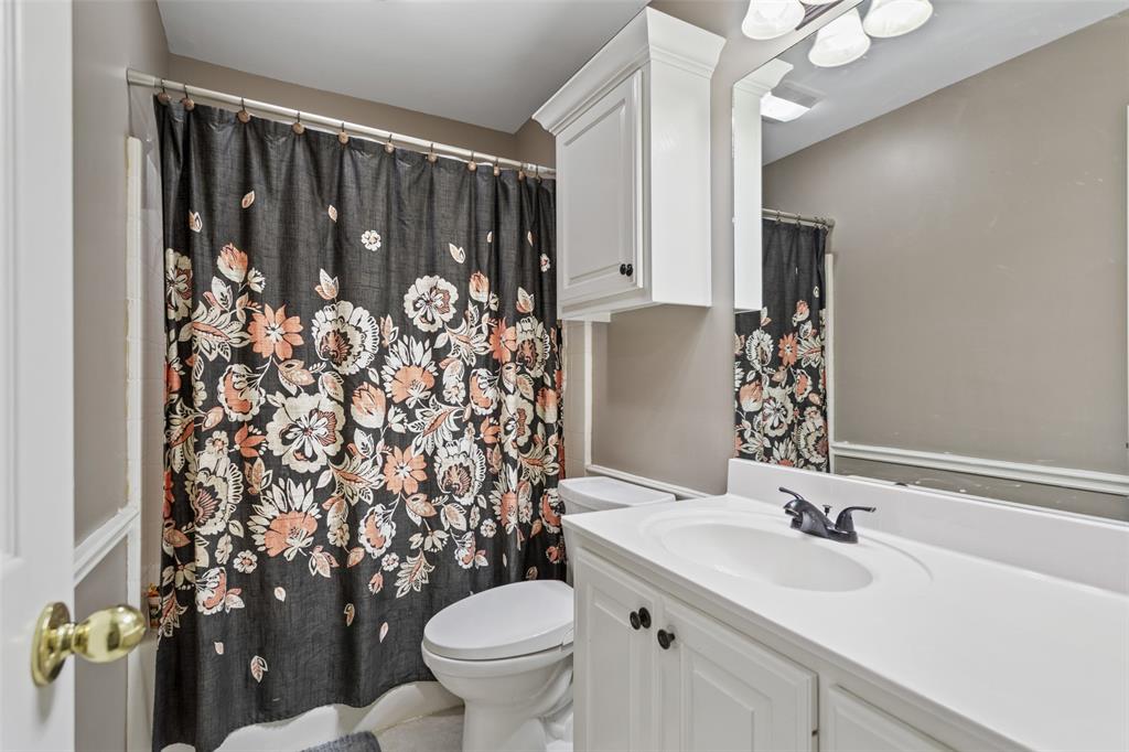 706 Maji Road Whitehouse, TX 75791 - Photo 24 of 37 a bathroom with a sink toilet and shower