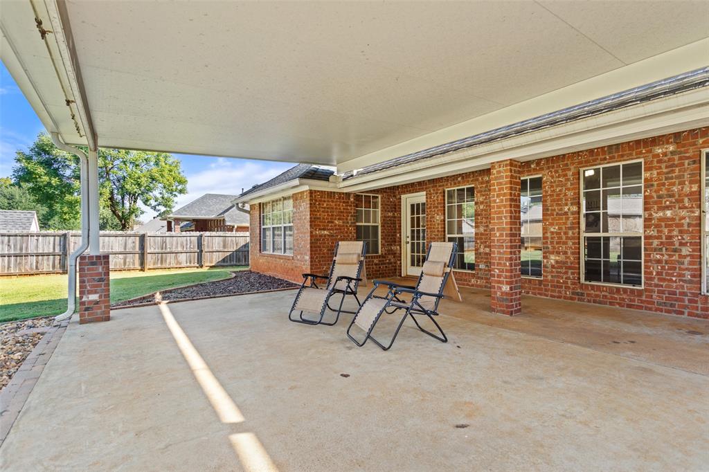 706 Maji Road Whitehouse, TX 75791 - Photo 28 of 37 a porch with a table and chairs