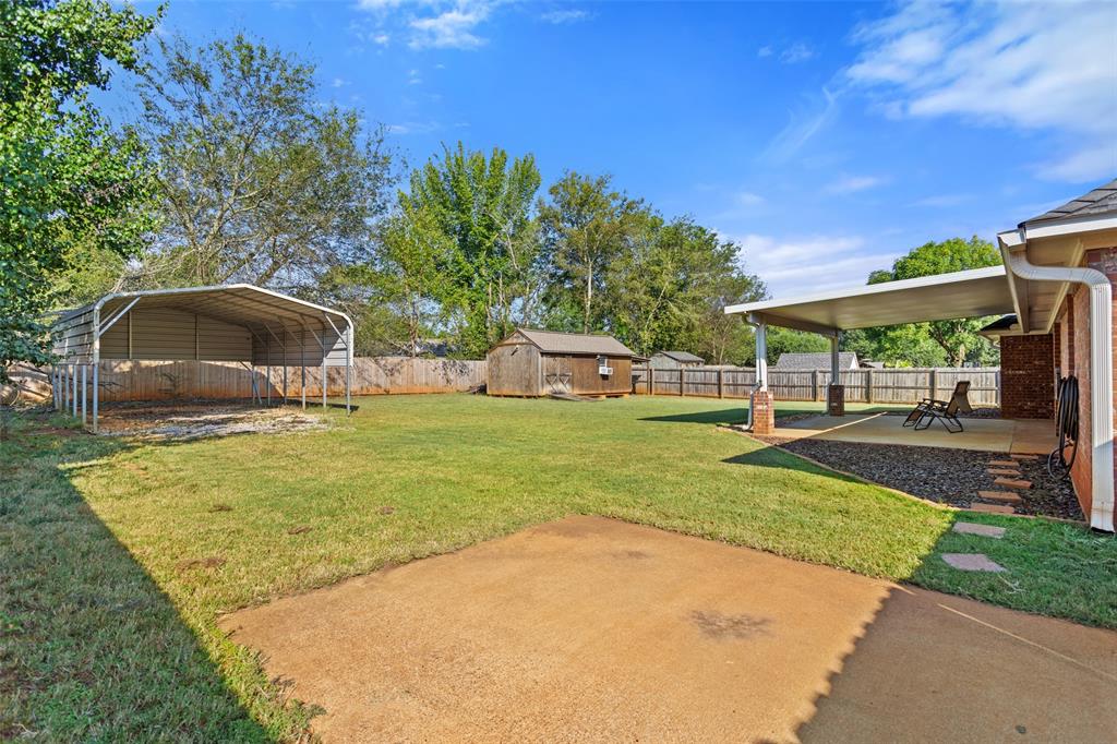 706 Maji Road Whitehouse, TX 75791 - Photo 32 of 37 swimming pool view with a garden