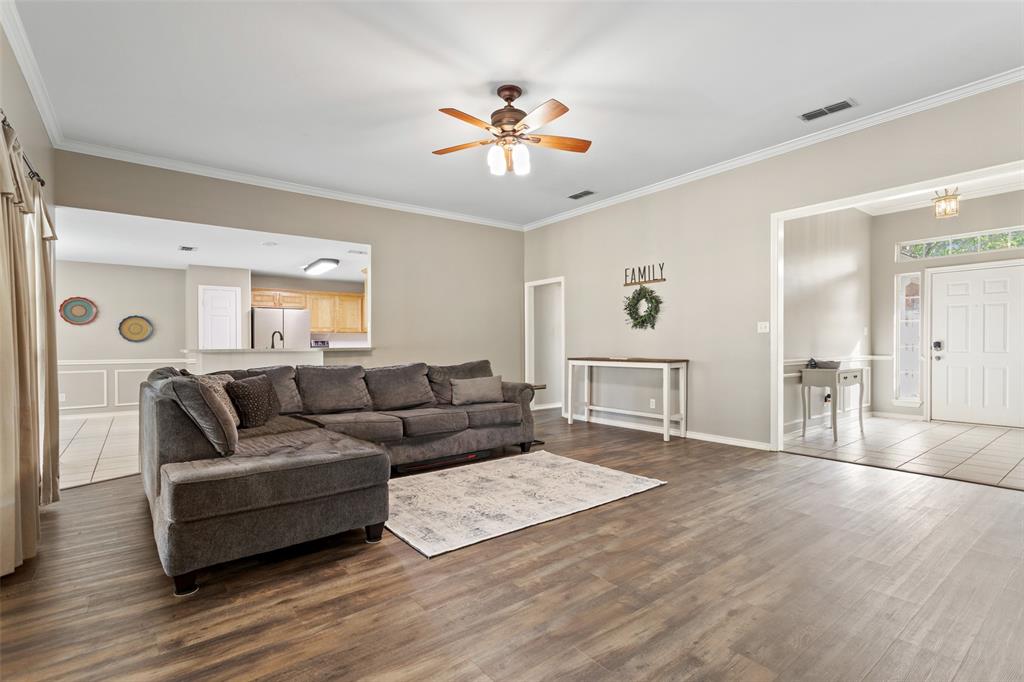 706 Maji Road Whitehouse, TX 75791 - Photo 9 of 37 a living room with furniture and a chandelier