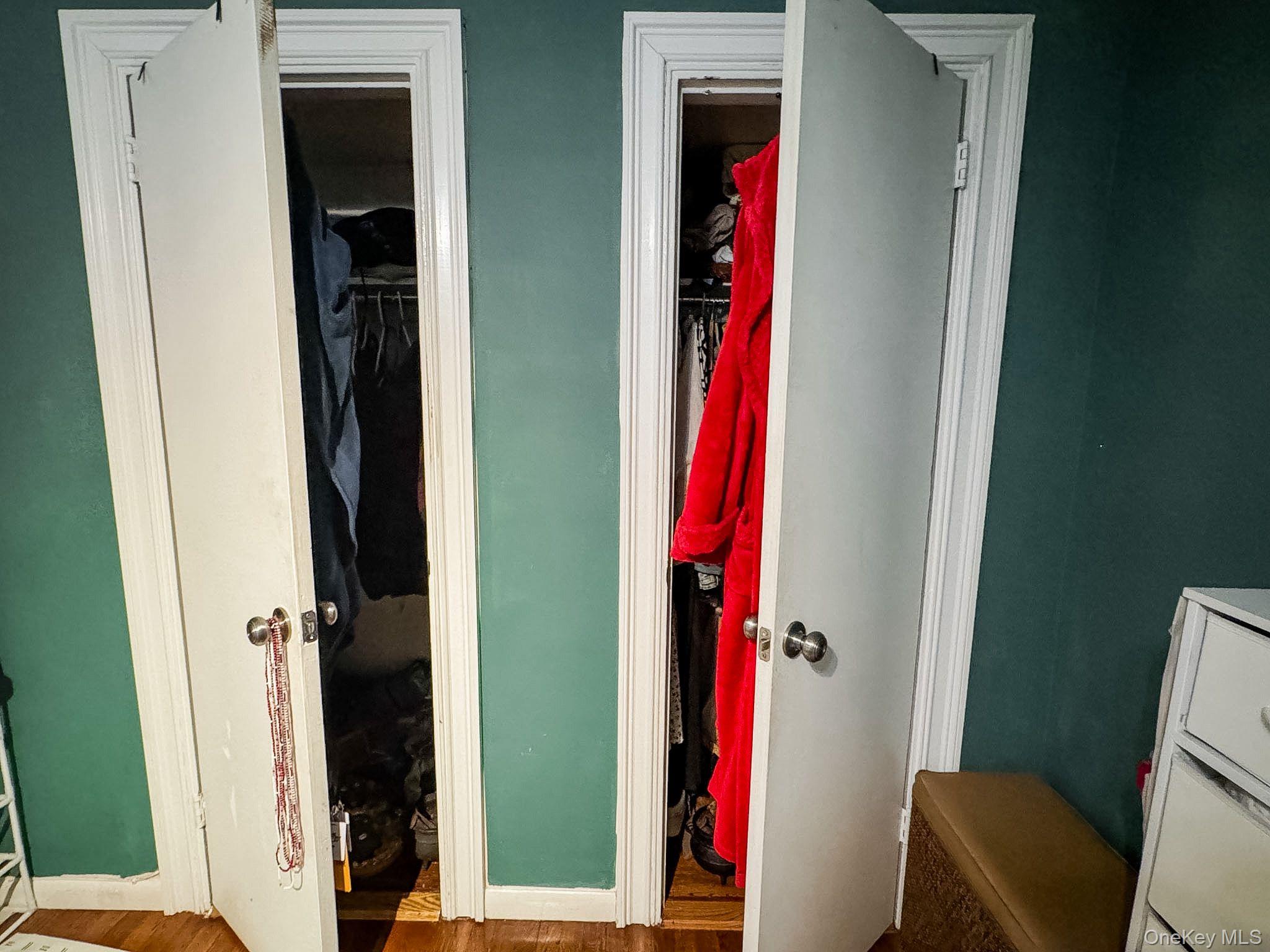 83-25 98th Street, Unit 1P Queens, NY 11421 - Photo 14 of 16 a view of hallway with furniture and shower