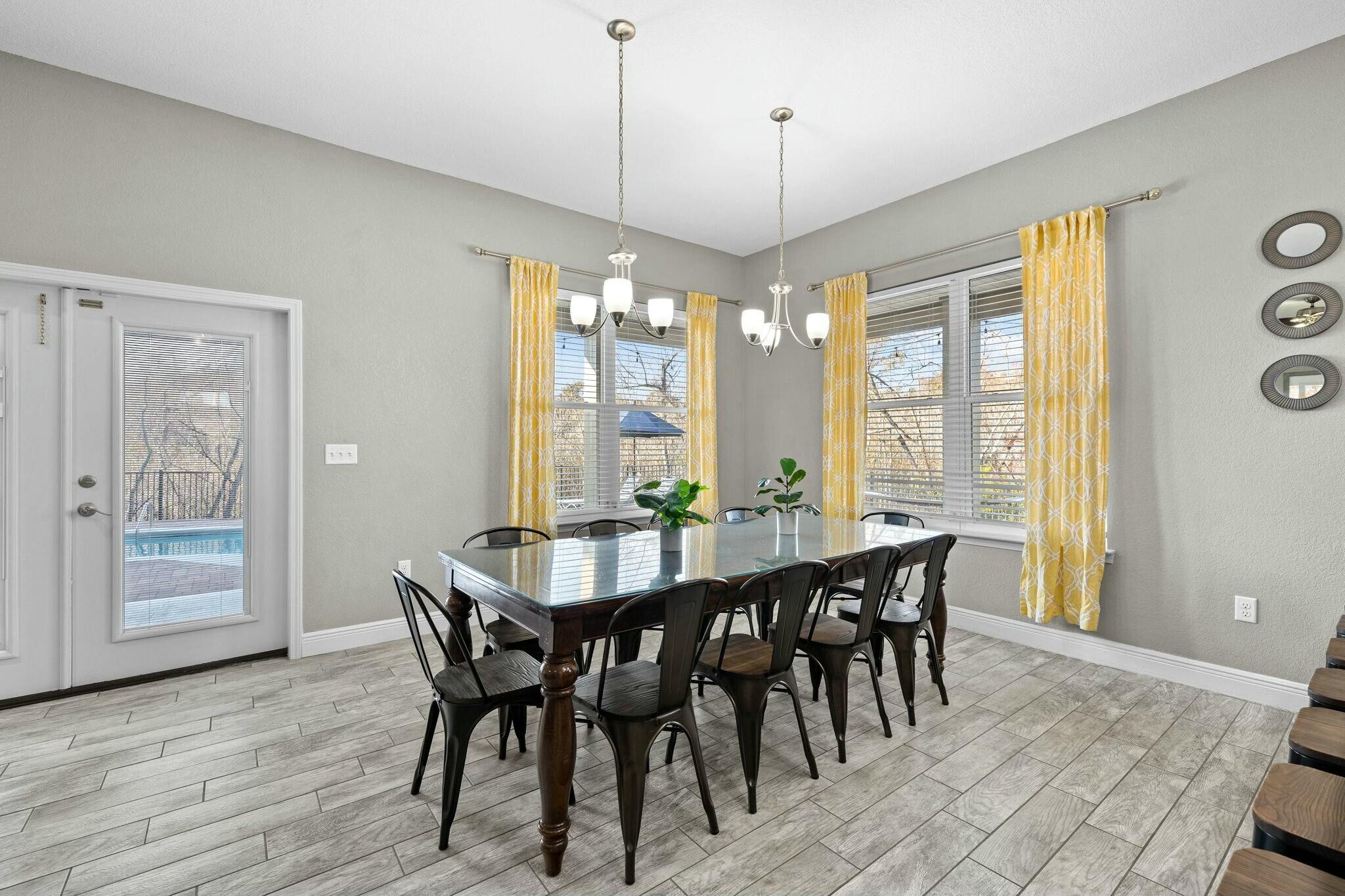4596 Paradise Isle Destin, FL 32541 - Photo 24 of 60 a view of a dining room with furniture window and wooden floor