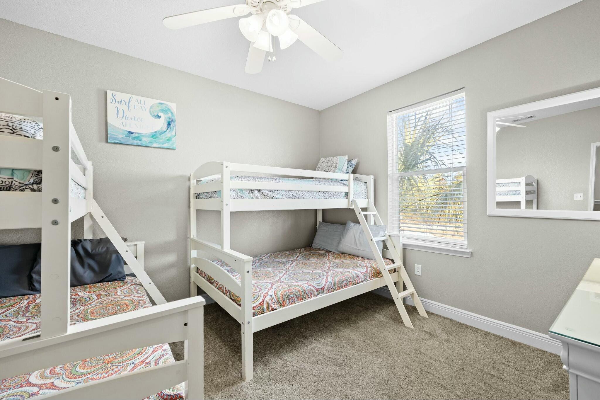 4596 Paradise Isle Destin, FL 32541 - Photo 32 of 60 a room with a bed and a window