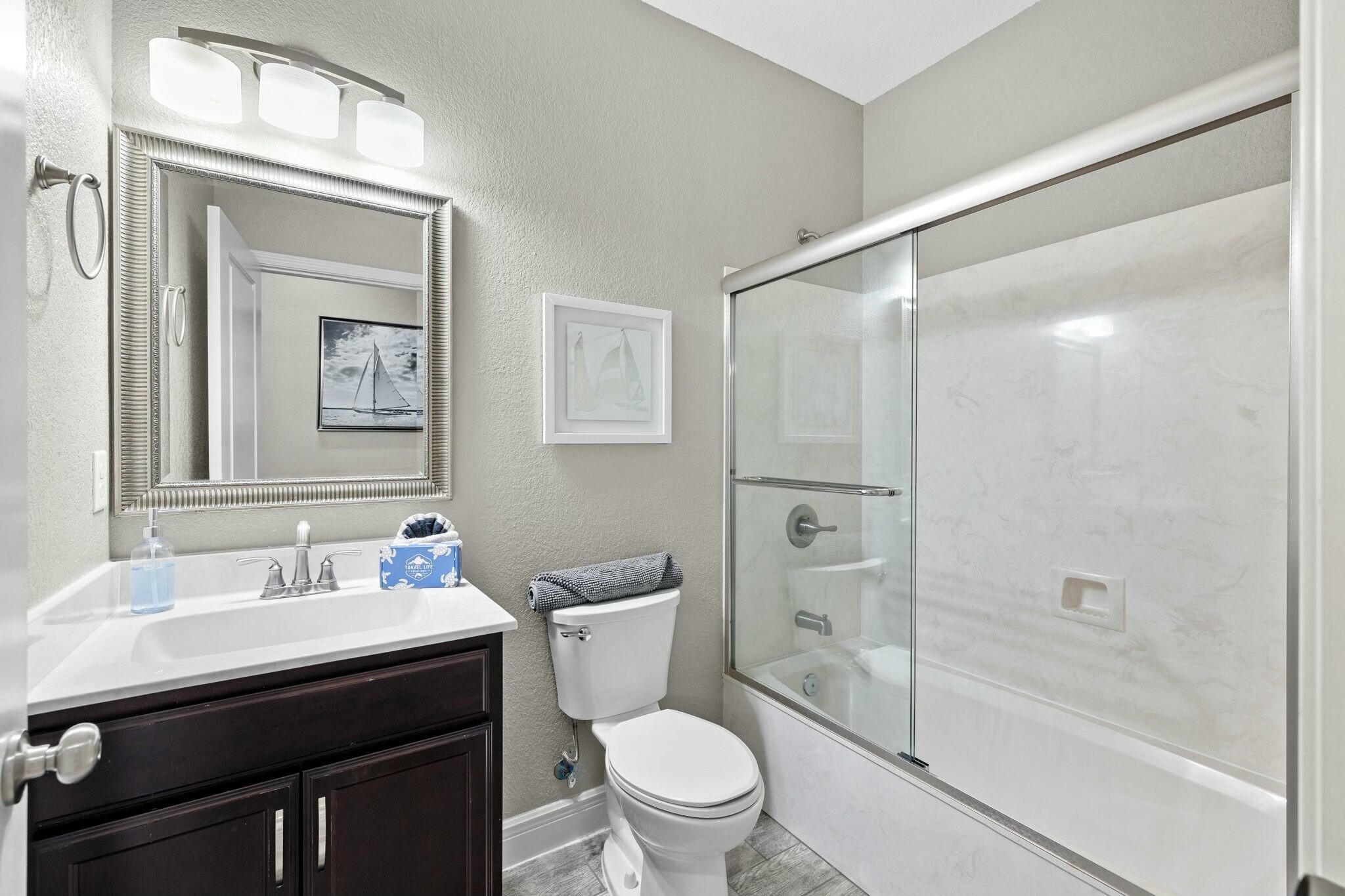 4596 Paradise Isle Destin, FL 32541 - Photo 34 of 60 a bathroom with a sink a toilet and shower