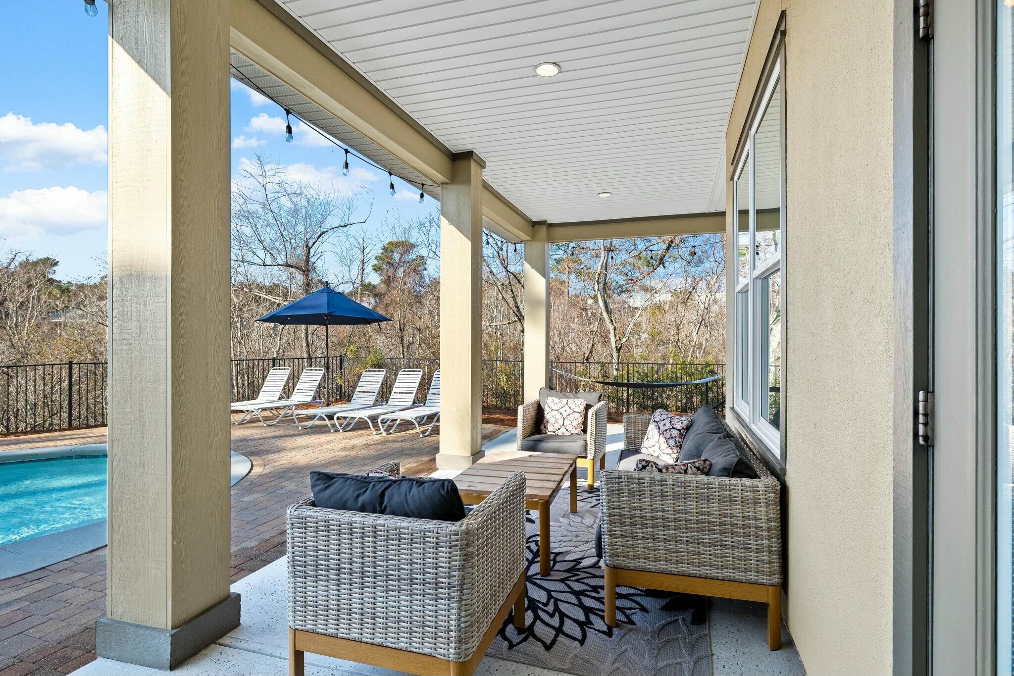 4596 Paradise Isle Destin, FL 32541 - Photo 46 of 60 a living room with furniture and a window