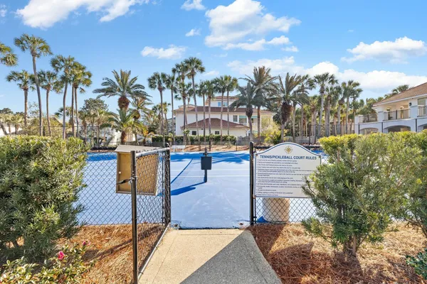 a view of a chairs and table in the patio