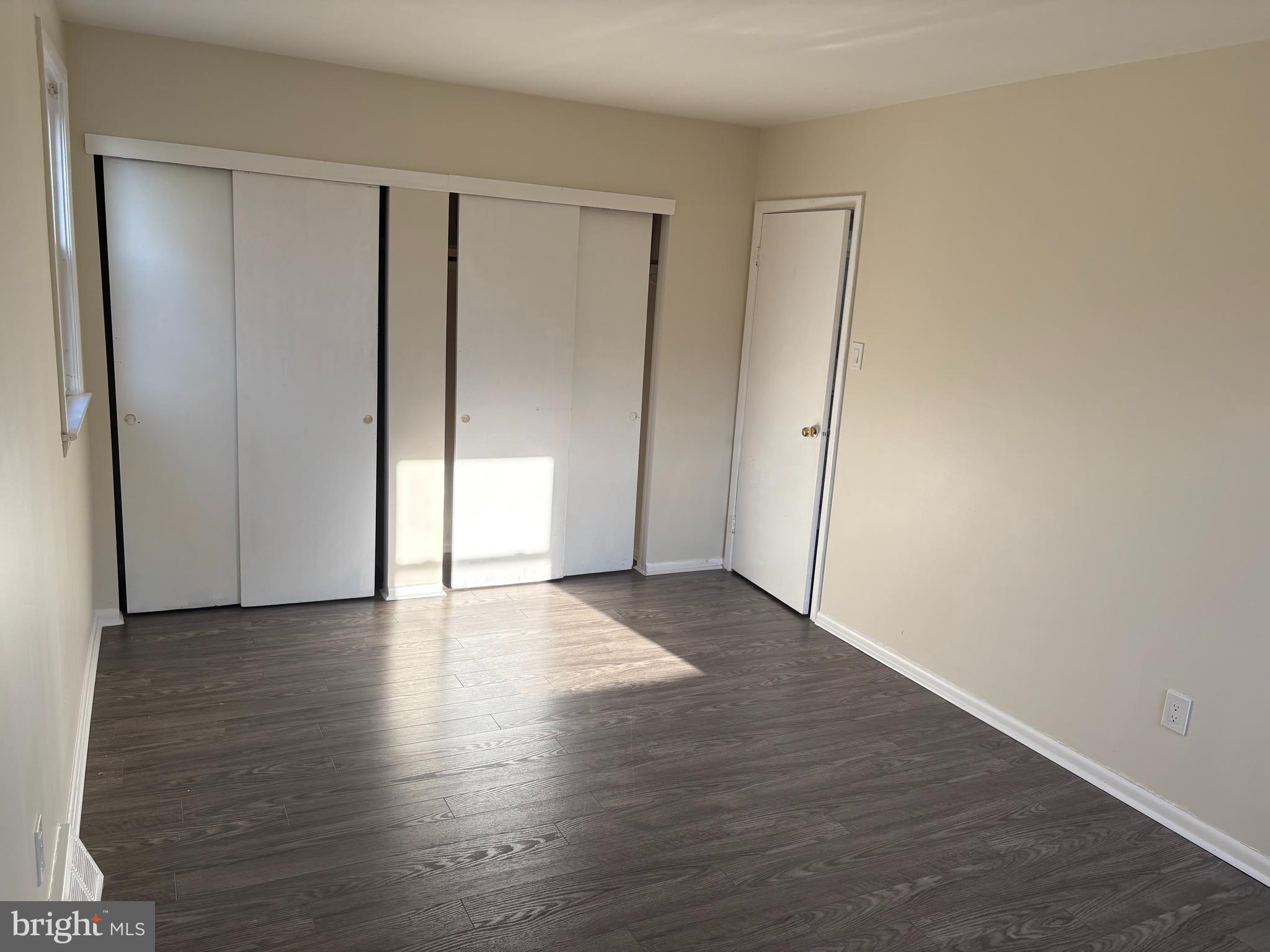 261 Ridgeway Terrace Philadelphia, PA 19116 - Photo 10 of 15 a view of an empty room with wooden floor and closet