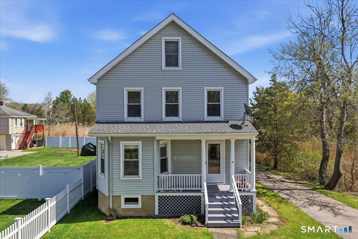 46 Hatch Street Stonington, CT 06355 - Photo 1 of 40 a front view of a house with garden