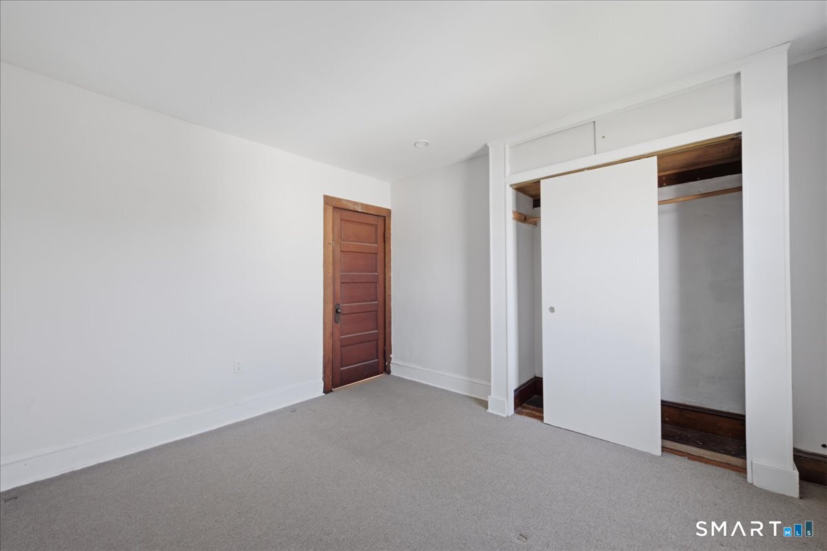 46 Hatch Street Stonington, CT 06355 - Photo 17 of 40 a view of an empty room