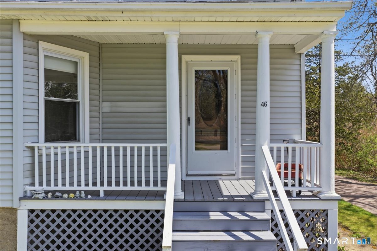 46 Hatch Street Stonington, CT 06355 - Photo 29 of 40 a view of a balcony with furniture