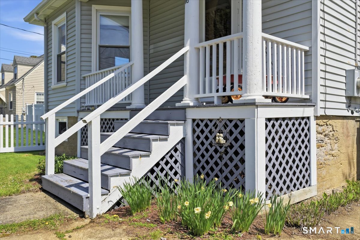 46 Hatch Street Stonington, CT 06355 - Photo 30 of 40 a view of balcony with wooden floor and fence