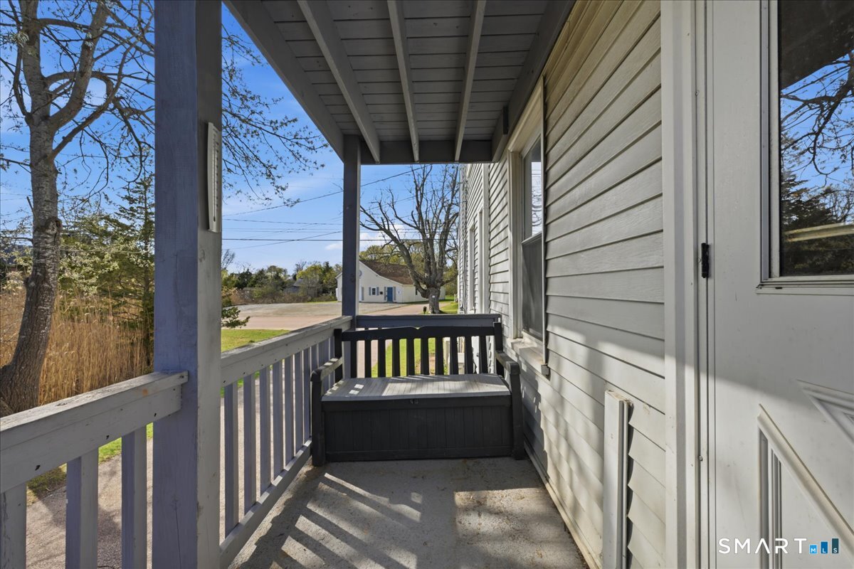 46 Hatch Street Stonington, CT 06355 - Photo 32 of 40 a view of porch with wooden floor