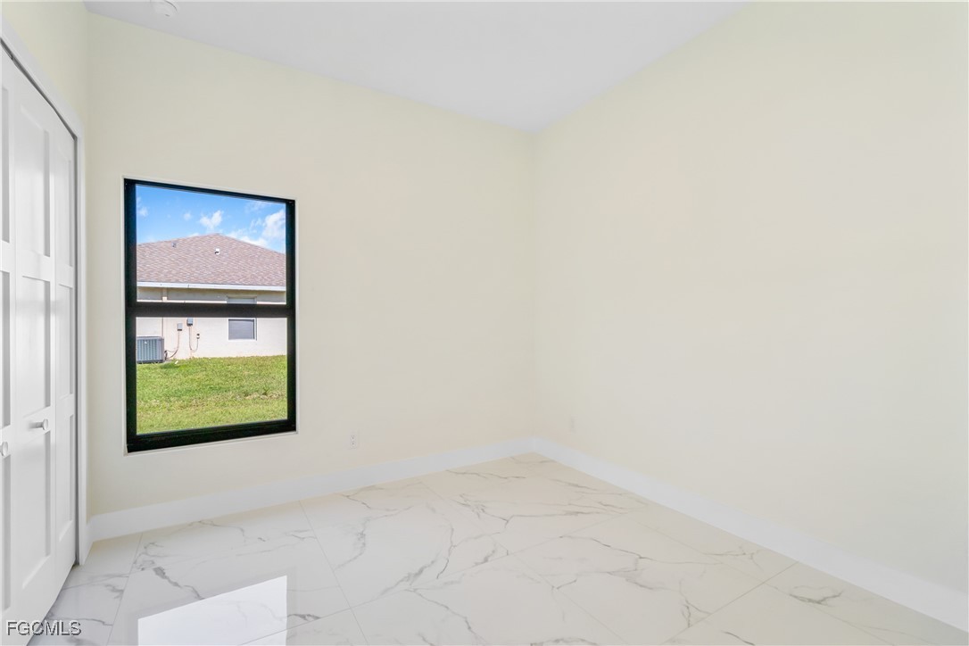 412 Fitch Avenue Lehigh Acres, FL 33972 - Photo 23 of 50 a view of an entryway