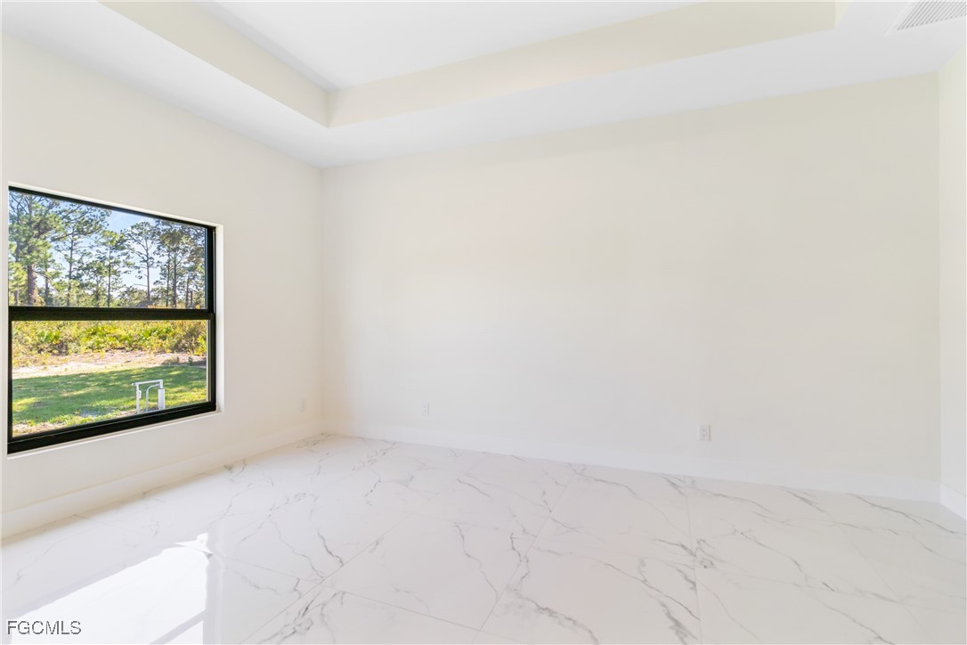 412 Fitch Avenue Lehigh Acres, FL 33972 - Photo 32 of 50 a view of a room with a window