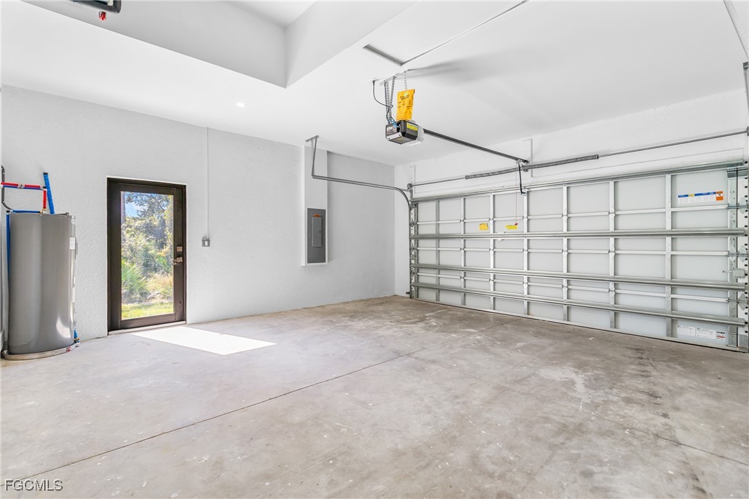 412 Fitch Avenue Lehigh Acres, FL 33972 - Photo 40 of 50 a view of a garage