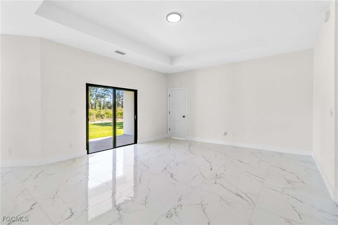 412 Fitch Avenue Lehigh Acres, FL 33972 - Photo 7 of 50 a view of an empty room and a sink