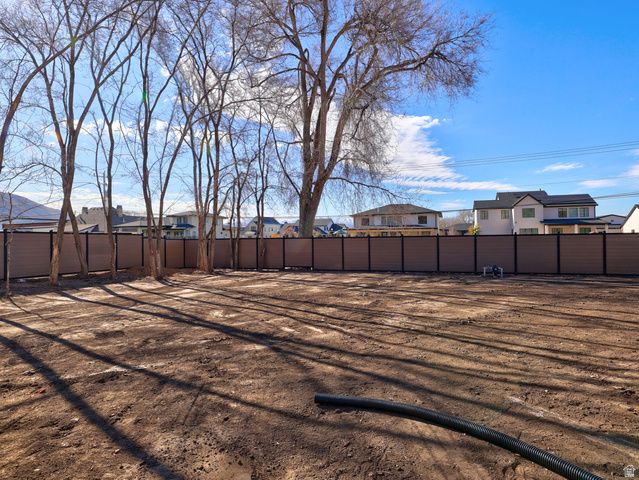 1306 East Victor Lane Draper, UT 84020 - Photo 53 of 60 View of yard featuring a residential view